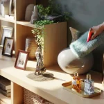 The hidden reason your decorative objects collect dust faster than anything else in your home